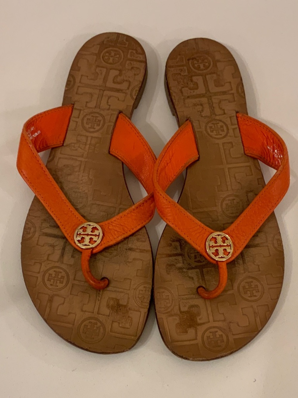 Tory Burch Orange Leather Logo Thong Sandals with Gold Medallions